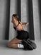 Women's fitness jumpsuit with zipper, shorts-style, and open back, Shadow Fit, (black), M
