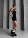 Women's fitness jumpsuit with zipper, shorts-style, and open back, Shadow Fit, (black), M
