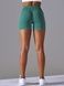 Women's seamless sports shorts with push-up for fitness with V-belt, V-shape, (emerald), S