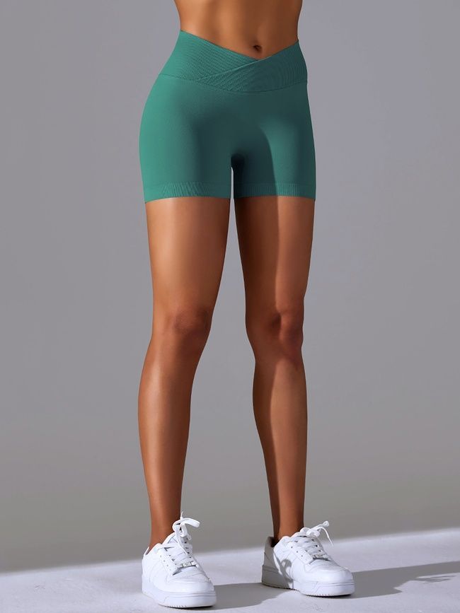 Women's seamless sports shorts with push-up for fitness with V-belt, V-shape, (emerald), S